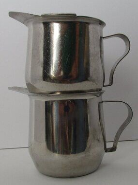 pair of stainless steel mini pitchers